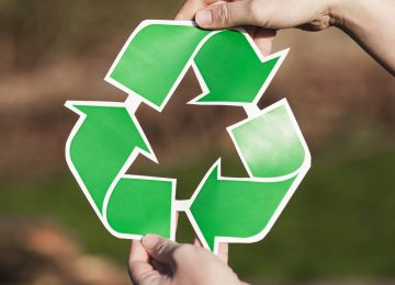recycle-background-with-woman-holding-recycle-sign recycle-background-with-woman-holding-recycle-sign